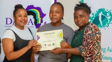 thumbnail image, of an AGYW receiving a certificate of training